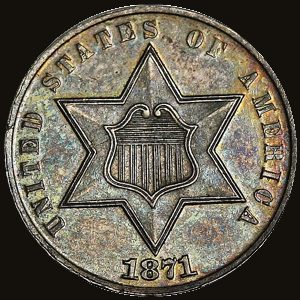 Obverse of an 1871 proof Three-Cent Silver coin, a star with a shield.