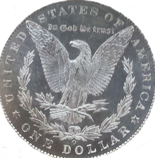 Reverse of a Morgan dollar with prooflike surfaces: the fields reflect light like a mirror around the frosted eagle.