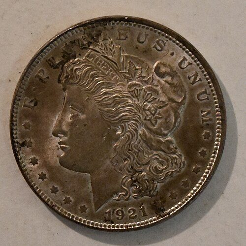 About Uncirculated: just a trace of wear on the highest points.