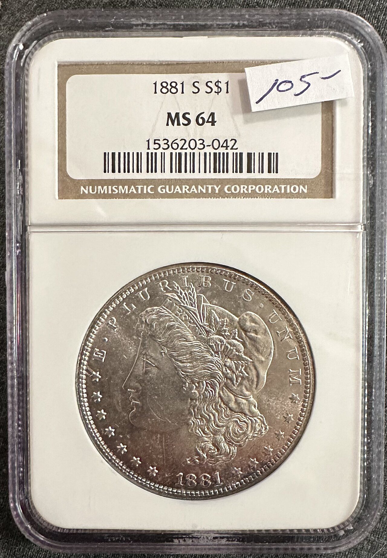 1881-S Morgan dollar with rainbow rim toning, certified NGC MS64