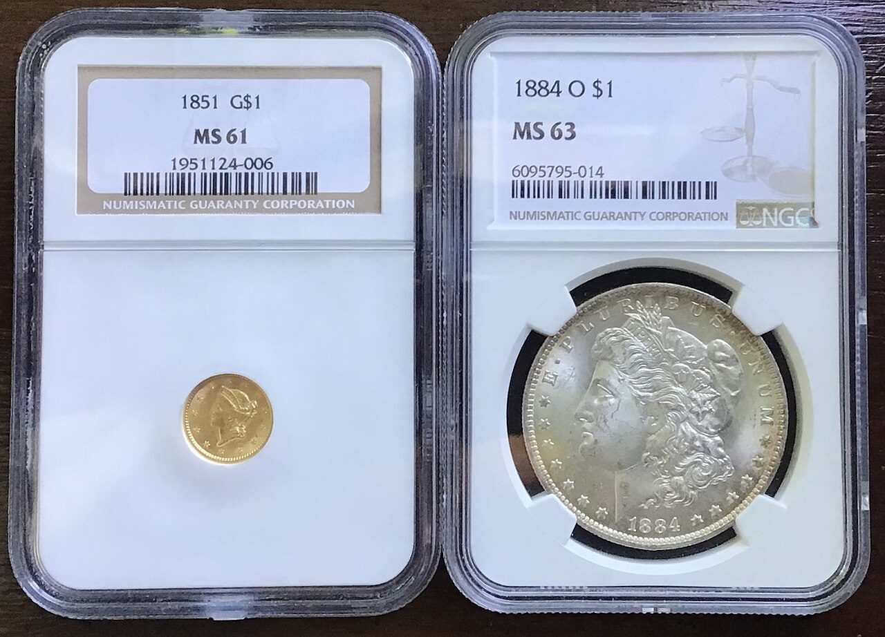 Two NGC-certified coins, a small 1851 gold dollar and an 1884-O Morgan dollar, side by side